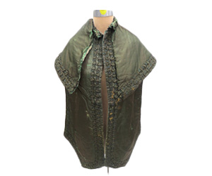 Forrest green silk pelerine or cloak with quilted self ruching trim.